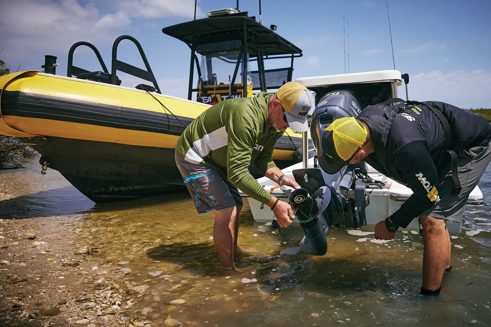 Sea Tow Captain helping fix a prop