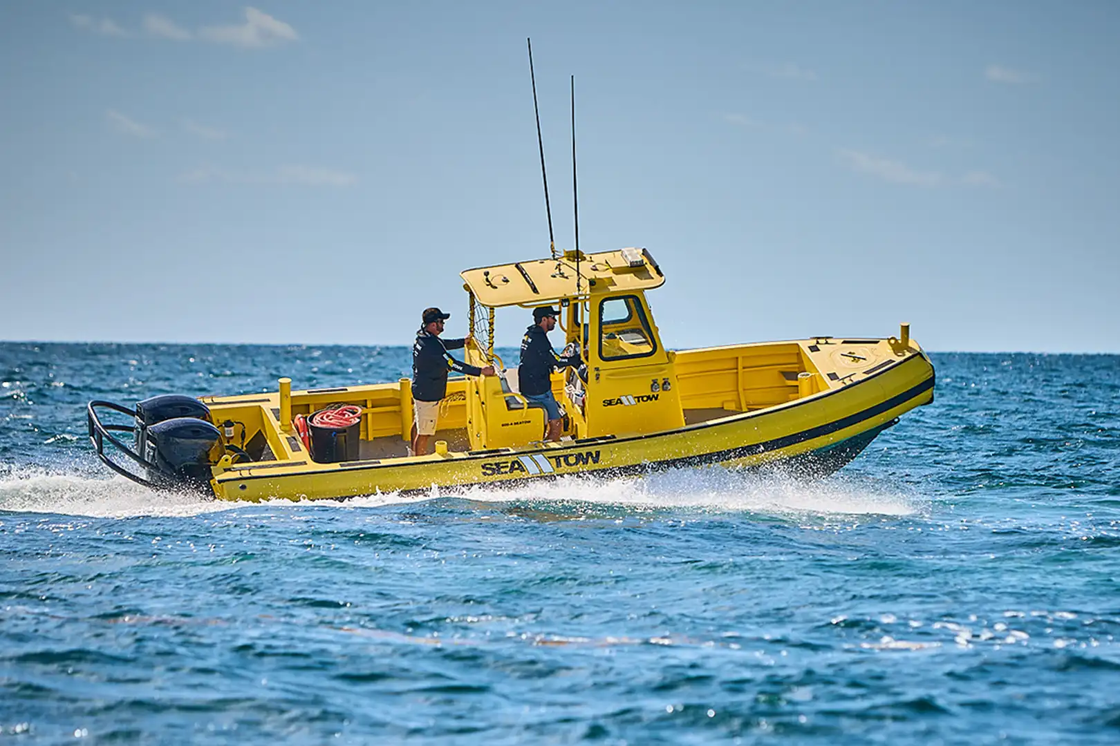 sea tow captains driving boat
