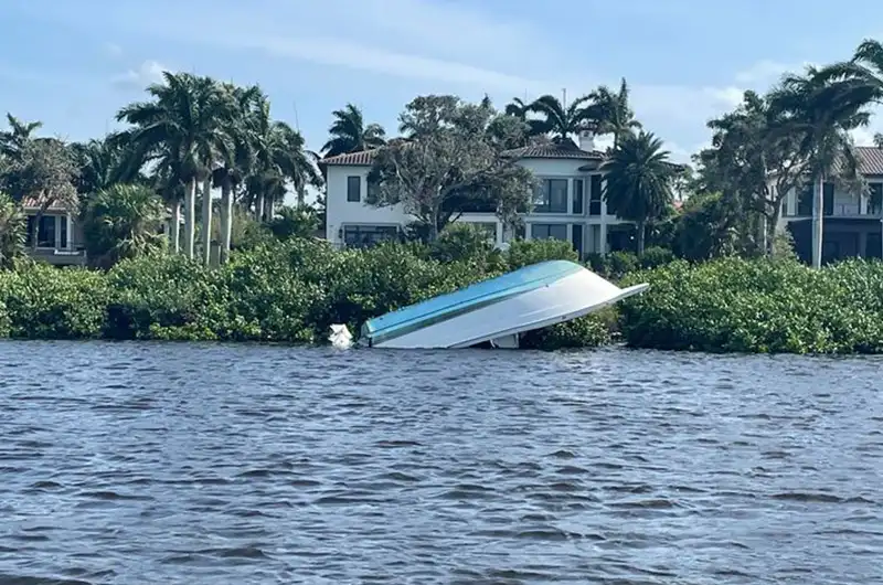 boat washed up on land